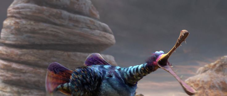 a blue and purple bird with a long stick in it's mouth standing next to some rocks