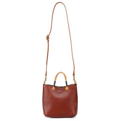 For a bag you can rely on, look to our Outwest Mini Tote. Handcrafted in soft genuine leather featuring, dual top handles, an adjustable shoulder strap, this bag combines practical features with our signature, expert craftsmanship. And, of course, its finished with our branded leather pullers and detachable main compartment charm. PRODUCT FEATURES 100% Genuine Leather 100% Vegetable Base Dyes 100% Recycled Hardware 100% Cotton Canvas Lining 100% Handcrafted Dual Top Handles Zipper Closure Exteri Versatile Leather Shoulder Bag With Top Handle, Leather Bag With Detachable Handle For Everyday, Brown Hobo Bag With Top Carry Handle For On-the-go, Leather Satchel With Handle Drop And Double Handle, Leather Bucket Bag With Detachable Handle For Everyday, Leather Shoulder Bag With Top Carry Handle For Shopping, Leather Top Handle Shoulder Bag For Daily Use, Everyday Leather Satchel With Top Handle, Everyday Leather Top Handle Satchel