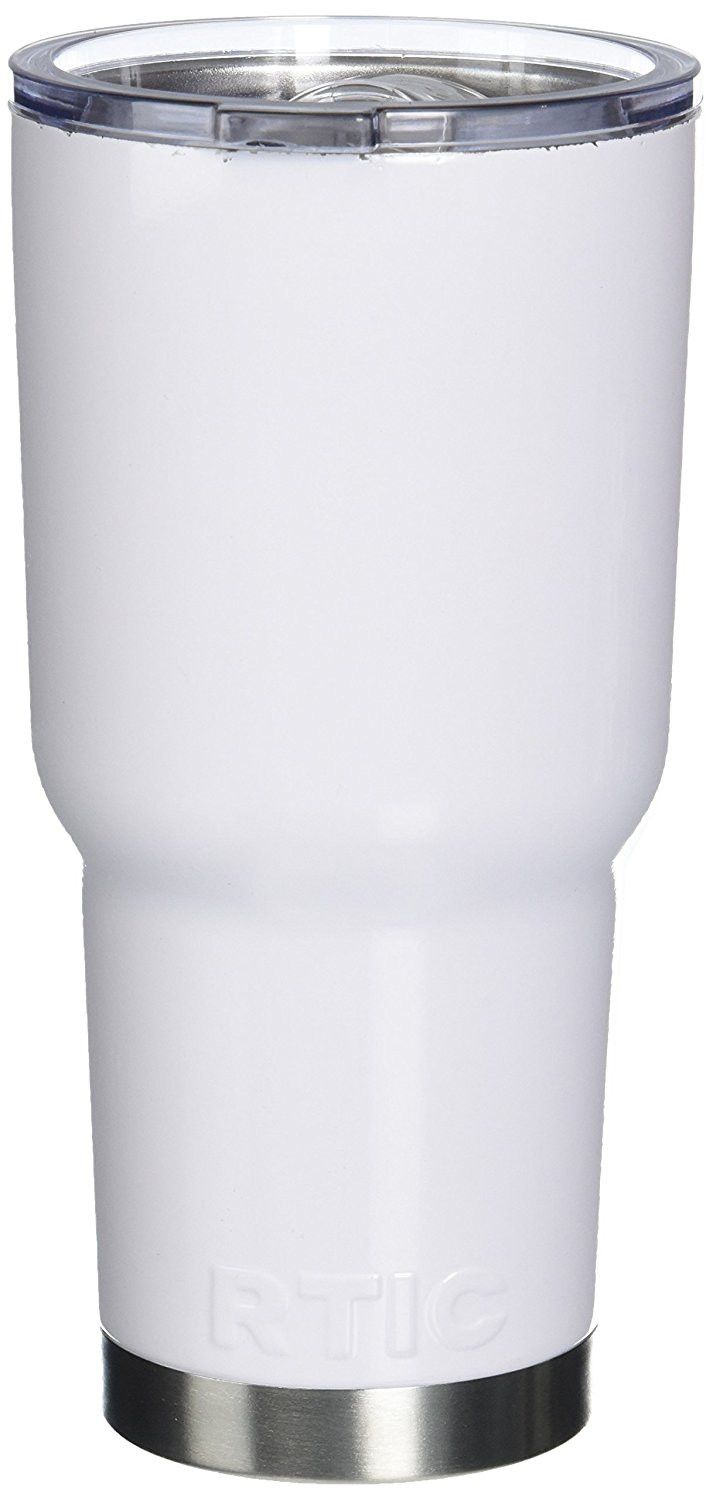 a white tumbler cup sitting on top of a table