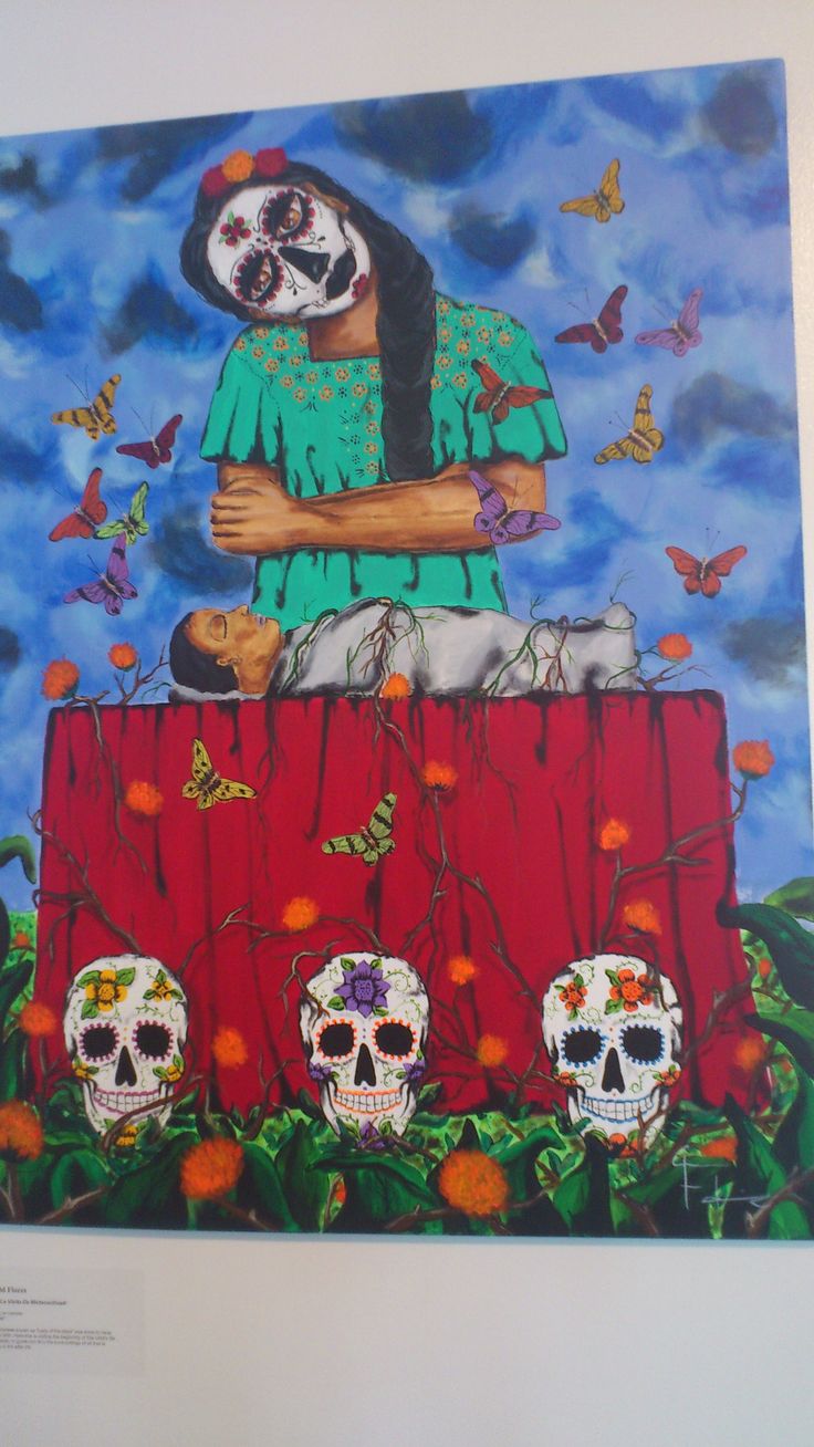 a painting of a woman with three skulls on her chest