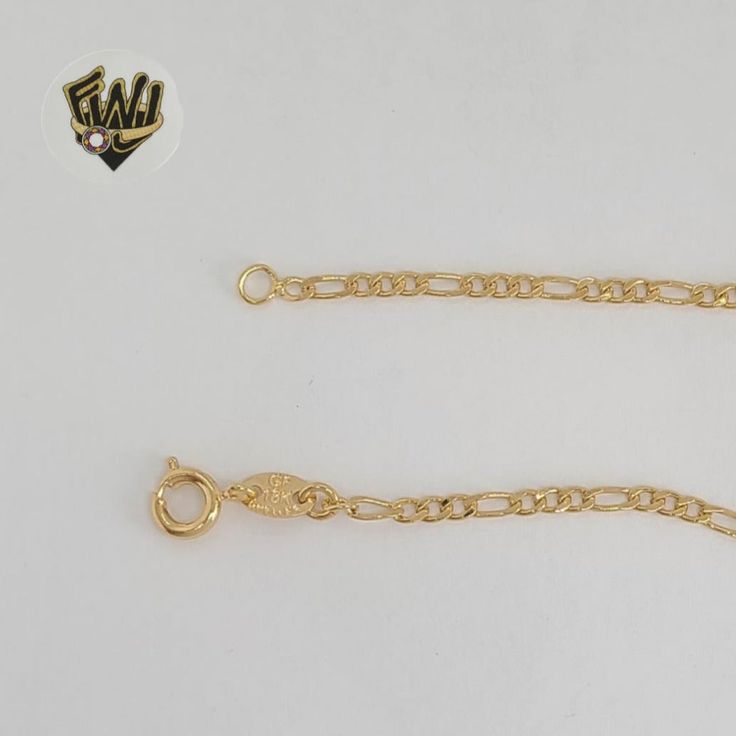 Description: -Figaro Link Plate Kids Bracelet. -Material: 18k Gold Filled (BGF). -Width: 2.5mm. -Thickness: 0.7mm. -Plate: 5mm. -Available in Size: 5.5". Select the Desired Style.