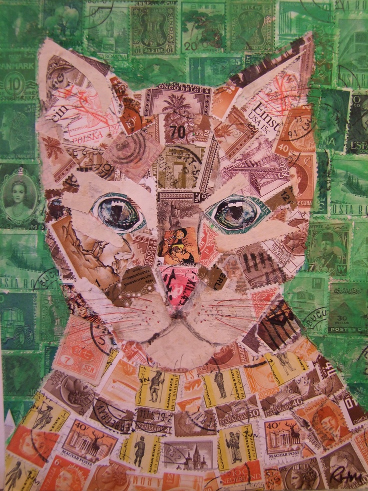 a cat made out of money sitting on top of a green wall covered in lots of stamps