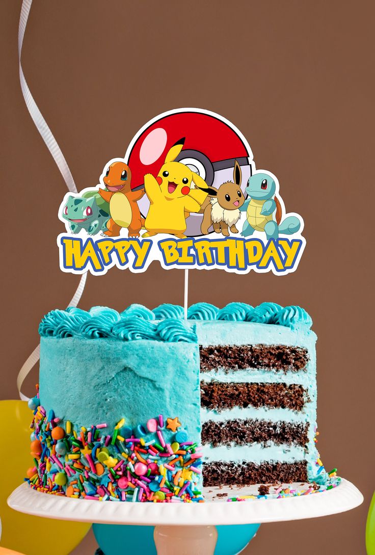 a pokemon themed birthday cake with the word happy birthday on it