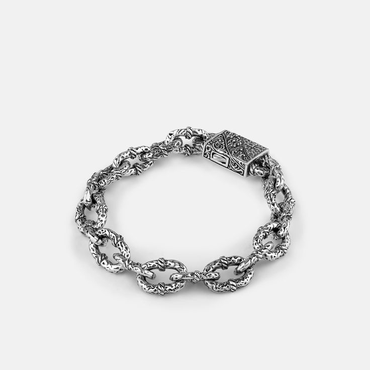 Featuring handcrafted textures and a custom clasp, this bracelet is inspired by heavy chain links found on vessels that brave the high seas. 12.5mm gauge links. Runs small, we recommend sizing up. Timeless Chain Link Bracelet With Lobster Clasp, Timeless Link Bracelets With Chunky Chain, Timeless Chunky Link Chain Bracelet, Timeless Chunky Chain Link Bracelet, Timeless Link Bracelet With Chunky Chain, Metal Cuban Link Bracelet With Oval Links, Sterling Silver Bracelets With Chunky Chain In Oval Link, White Gold Chunky Chain Link Bracelet, White Gold Chunky Link Chain Bracelet