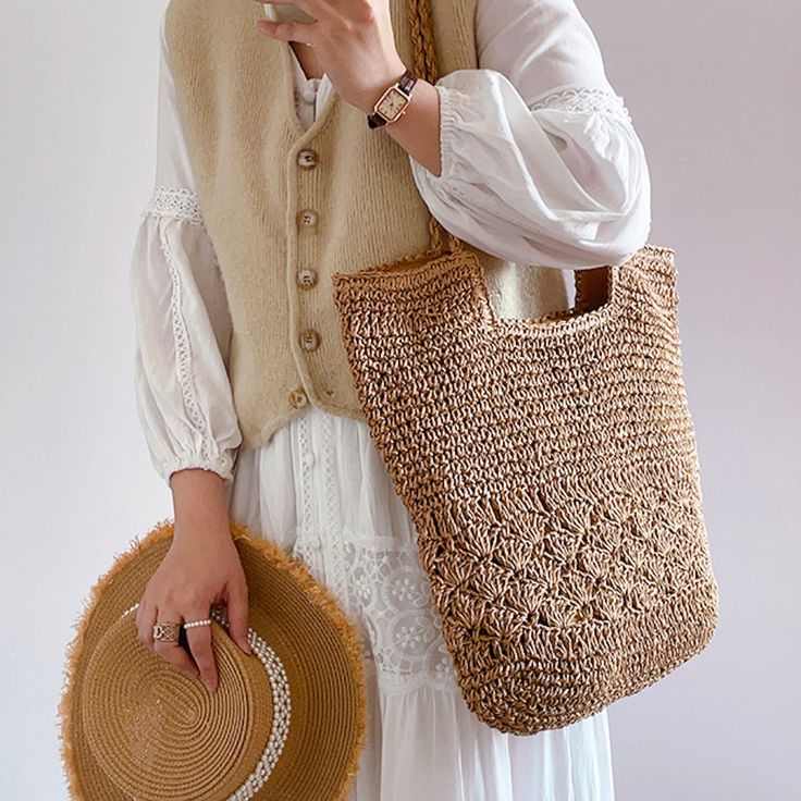 Chic simple straw woven tote bag perfect for all occasions. This stylish tote bag will elevate your look to the next level, providing a natural, neutral feel that works for any wardrobe. Size approximately 32cm wide x 34cm tall (12in x 13in) Designer Style ID: 8441 Chic Straw Woven Tote Bag, Vintage Vibes, Summer Bag, Everyday Shoulder Bag, Beach Bag Casual Beige Crochet Straw Bag, Trendy Handwoven Beige Bucket Bag, Casual Beige Jute Beach Bag, Casual Natural Fiber Shoulder Bag With Open Weave, Casual Shoulder Bag With Open Weave Natural Fiber, Casual Shoulder Bag With Open Weave In Natural Fiber, Casual Natural Straw Bag With Double Handle, Natural Straw Bag With Double Handle, Casual Open Weave Natural Color Shoulder Bag