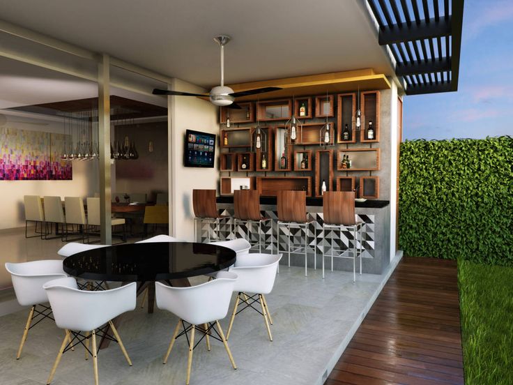 a dining room table with white chairs around it