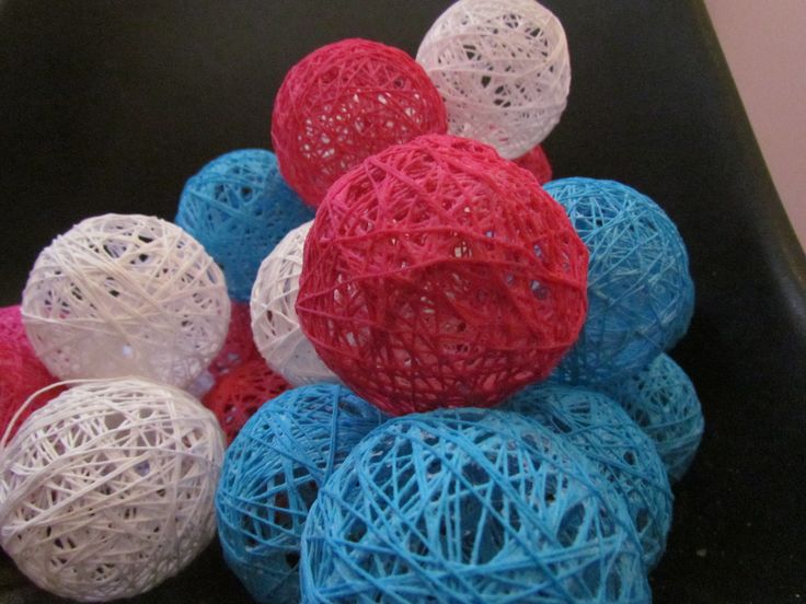 several balls of yarn are stacked on top of each other in the shape of hearts