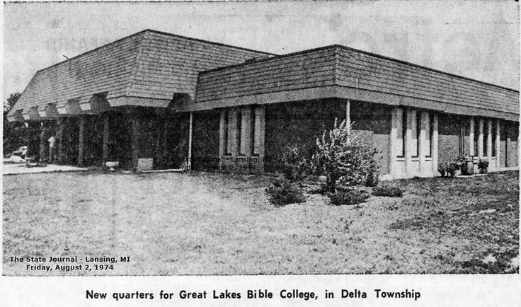 an old black and white photo of a building with two dormies on the front