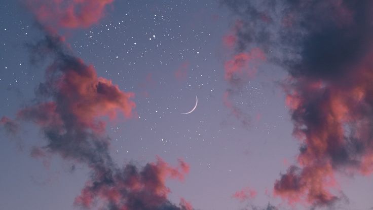 the sky is filled with clouds and stars as the moon shines in the distance