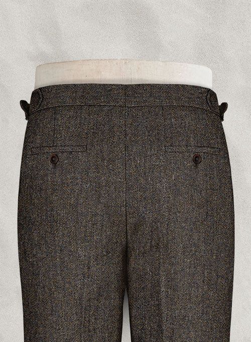 Do you want to elevate the way you look and create outfits that fit to perfection, then opt for our Haberdasher Brown Highland Tweed Trousers. Crafted from wool, the trousers feature classic herringbone weave whereas the tweed-inspired fabric combines with contemporary tailoring that is ideal for when you want to look that bit special. 
 
 Look Includes  Haberdasher Brown Tweed Fabric  Cross Pocket  Forward 2 Pleats  Side Tabs (No Loops)- Arrow Shape  Bottom Cuff (1.5")  Two Welted Back Pockets Formal Tweed Pants With Herringbone Pattern, Formal Tweed Bottoms With Herringbone Pattern, Elegant Fitted Tweed Bottoms, Formal Wool Pants With Herringbone Pattern, Tailored Tweed Pants For Fall, Formal Tailored Tweed Bottoms, Tailored Tweed Bottoms For Formal Occasions, Formal Tweed Tailored Bottoms, Elegant Tweed Pants For Business