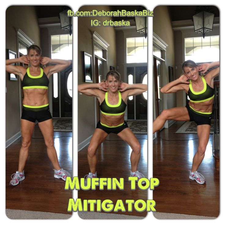 a woman in a black and yellow top doing a squat exercise with her hands behind her head