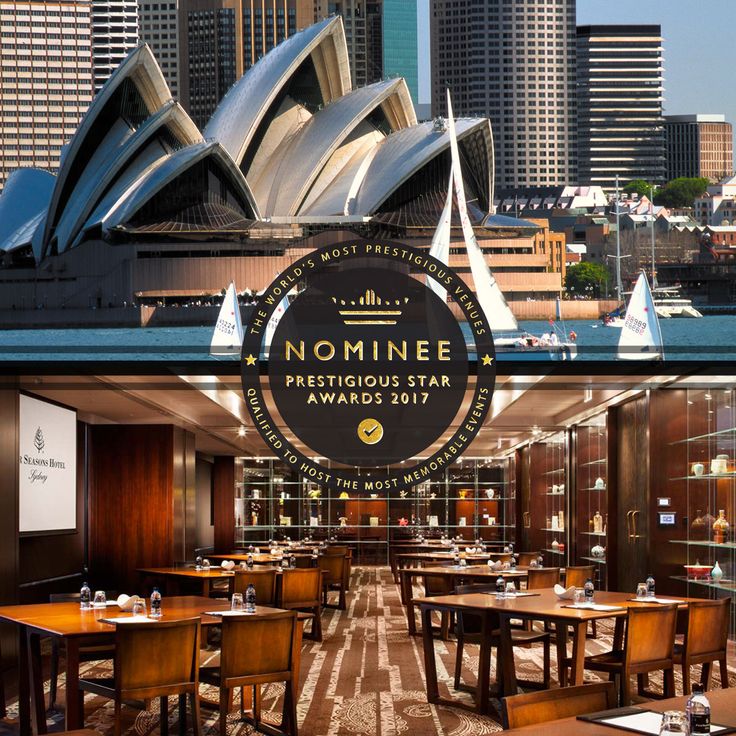 the restaurant is set up with wooden tables and chairs, along with an image of the sydney opera