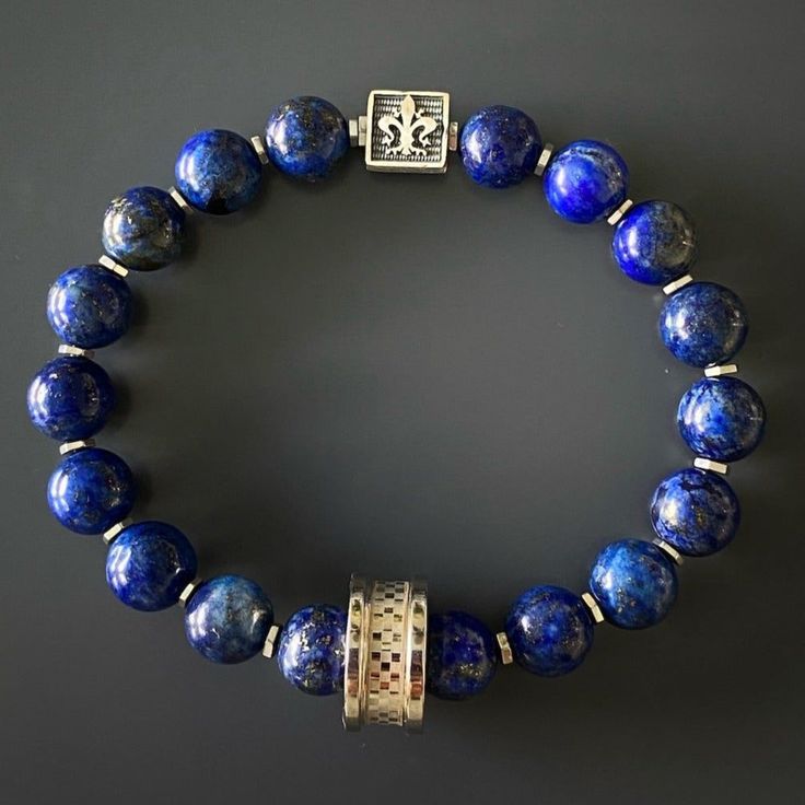 Elegant Blue Beads Bracelet, Elegant Blue Bead Bracelet, Sapphire Lapis Lazuli Beaded Bracelet With Natural Stones, Elegant Rondelle Beads With Natural Stones, Sapphire Lapis Lazuli Gemstone Beaded Bracelets, Spiritual Sapphire Beaded Bracelets Hand-strung, Sapphire Lapis Lazuli Beaded Bracelets, Sapphire Gemstone Beads Bracelet In Lapis Lazuli, Spiritual Sapphire Beaded Hand-strung Bracelet