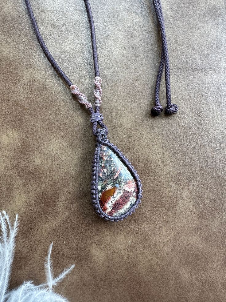 Add a touch of bohemian flair to your outfit with this handmade macrame pendant necklace featuring a Moss agate. This unique piece is perfect for those who love natural gemstones. Makes a great gift for a loved one or yourself! Macrame hand crafted macrame necklace with beautiful gemstone. Made with high quality, durable waxed polyester cord, which can maintain its colour and shape. The necklace is adjustable length due to a sliding knot on the back. ★★material and size★★ necklace max length : a Brown Bohemian Teardrop Pendant Jewelry, Crystal Necklace Healing, Macrame Pendant, Healing Stones Necklace, Bohemian Crystal, Chakra Necklace, Love Natural, Handmade Macrame, Macrame Necklace