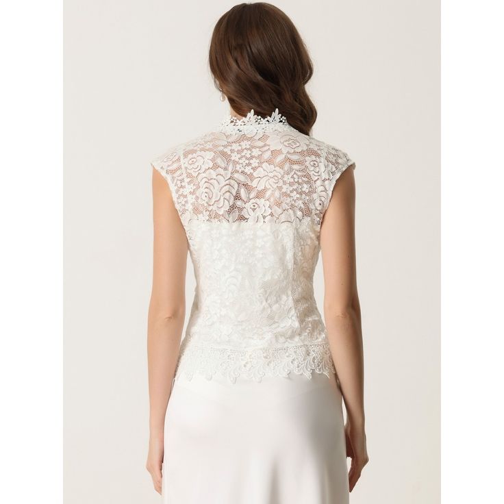 These feminine shrug tops with floral crochet lace fabric, and elegant see-through design, can make you more charming and attractive. The hollow-out crochet lace shrug featuring cap sleeves can show your curves and perfect arm line. Perfect for daily casual, office wear, wedding guests, cocktail parties, evening, or anywhere. Pair it with the casual sleeveless cami top or elegant spaghetti strap dress for a cocktail party. Feminine Lace Collar Top For Wedding, Elegant Lace Top For Wedding Night, Lace Collar Top For Spring Wedding, Spring Wedding Lace With Lace Collar, Lace Top With Lace Sleeves For Wedding, Elegant Sleeveless Lace Top With Collar, Elegant Fitted Tops With Lace Patchwork, Lace Wedding Top With Lace Collar, Fitted Lace Trim Top For Wedding Night