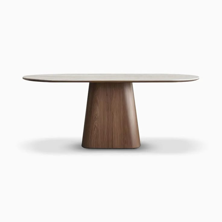 an oval table with a wooden base and white top, against a white background that has no people around it