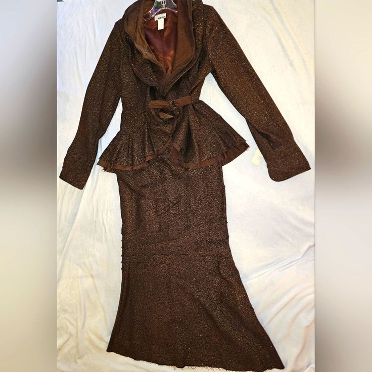 Nwt, Brown Tweed Print Suit, Jacket Is A High Low Peplum Design, With A Double Collar And A Tie At The Waist, Measures 18in Flat From Arm Pit To Arm Pit, The Skirt Is Mermaid Style, With Back Zipper, Button And Elastic In The Waist, Waist Measures 14in Flat, Hip 18in Flat Across, Skirt Is 40in From Waist To Hem. No Smoke No Pet Home. Two Piece Outfits Skirt, High Neck Sleeveless Top, Vintage Skirt Suit, Peplum Design, Peplum Designs, Womens Skirt Suits, Blazer And Skirt Set, Crop Top Skirt Set, Embellished Skirt