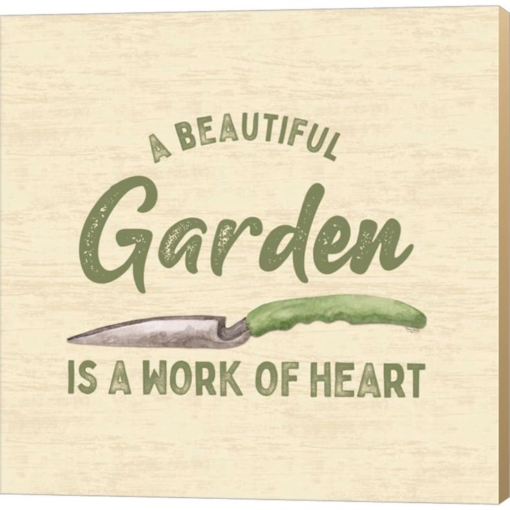 a beautiful garden is a work of heart canvas print on white wood with green lettering