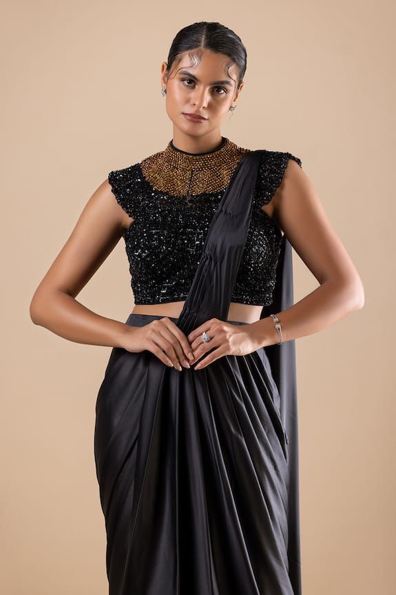 Black pre-draped saree. Paired with a padded blouse with crystal, cutdana, sequins and Swarovski embroidery. - Aza Fashions Glamorous Evening Pre-draped Saree With Pallu, Evening Blouse Piece With Mirror Work In Traditional Drape, Black Pre-draped Saree With Zari Work, Bollywood Style Party Blouse With Traditional Drape, Formal Draped Saree With Unstitched Blouse, Evening Blouse Piece With Mirror Work, Saree With Padded Blouse For Party In Traditional Drape, Saree With Padded Blouse For Party, Silk Blouse Piece With Draped Sleeves For Party