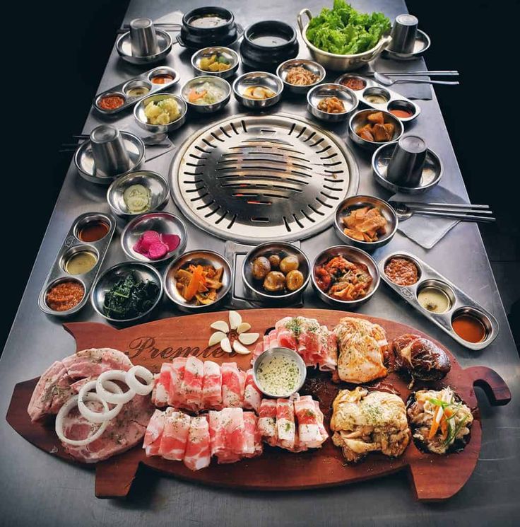 a table topped with lots of different types of food