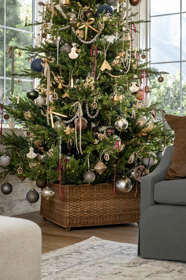 a decorated christmas tree in a living room