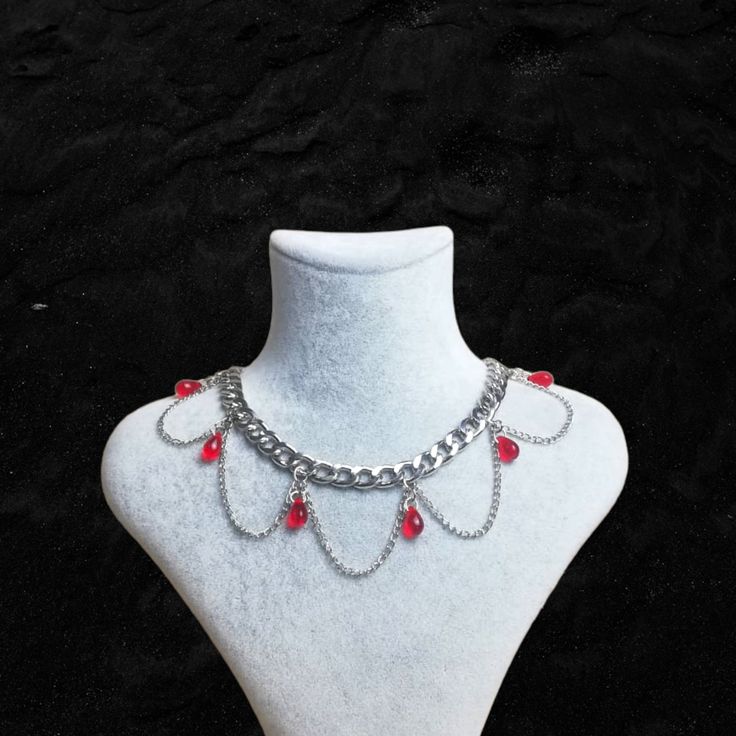 ▪Grunge Choker▪ Gothic design formed by the combination of red and chain ❤ Really cool chunky chain choker necklace ▪ 35 cm and adjustable ▪ It is handmade 🖤 ▪ If you have any questions, I'll be happy to answer 💌 ▪ Avoid contact with perfume or other chemicals 🌿 Streetwear Metal Necklace With Chunky Chain, Alternative Fashion Chain Choker Necklaces, Alternative Fashion Chain Choker Necklace, Choker Chain Necklaces For Alternative Fashion, Emo Style Festival Jewelry With Chain, Punk Chain Necklace For Streetwear, Trendy Metal Necklaces For Alternative Fashion, Emo Metal Necklace For Festivals, Emo Metal Necklace For Party