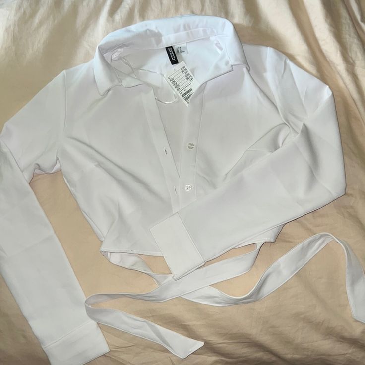 Purchased In Europe Size 38 Super Cute Wrap Waist Brand New W Tags Elegant H&m Shirt For Spring, Elegant Collared H&m Blouse, Elegant H&m Collared Blouse, Elegant Collared Blouse By H&m, Casual White Shirt For Night Out, White Fitted Shirt For Party, White Crop Top For Night Out, Elegant White Crop Top For Workwear, Elegant White Long Sleeve Crop Top