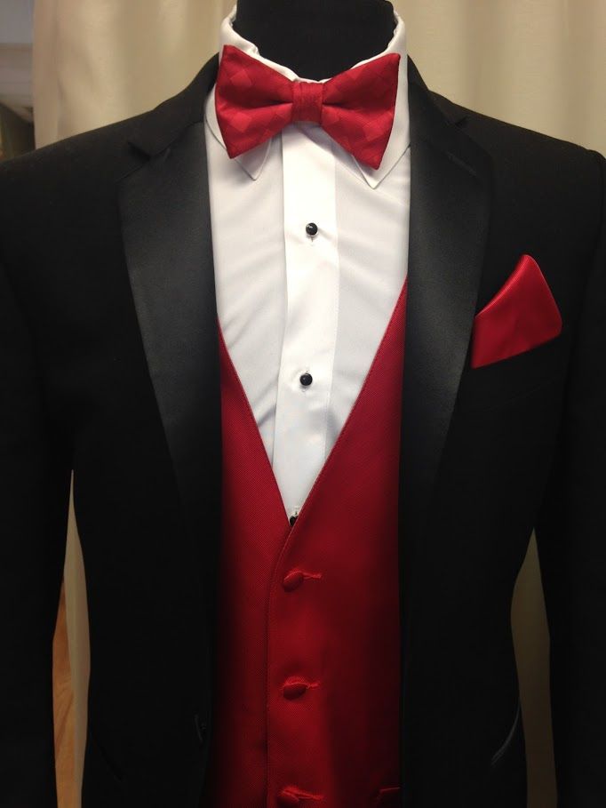 a red and black tuxedo is on display