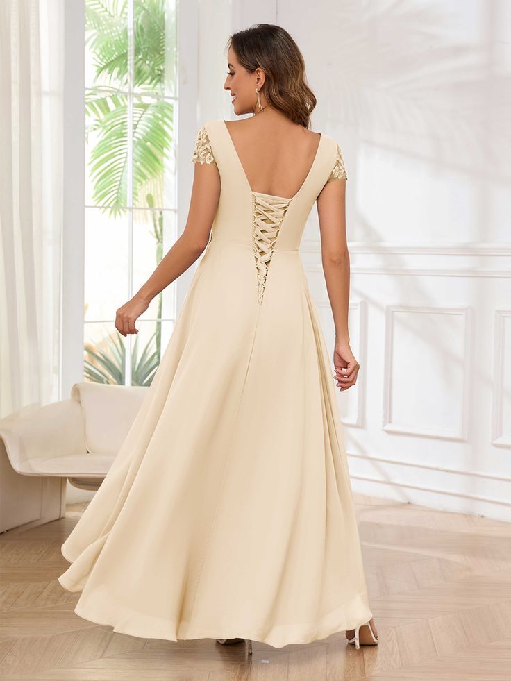 Wow everyone at your daughter's wedding in the stunning Monroe Charming Two Pieces Sequins Appliques High Low Mother Of The Bride Dresses. Featuring a beautiful high low design, these dresses are both chic and elegant. Feel confident and glamorous as you celebrate this special day with your loved ones. Silhouette: A-line Fabric: Chiffon (Non-Stretch) Neckline: V-neck Embellishment: Two Pieces; Appliques; Ruched Back Style: Lace Up Sleeve Length: Short Sleeves Dress Length: High Low Fully lined b Wedding Dress With Lace-up Back And Lace Material, Lace Evening Dress With Lace-up Back For Wedding, Floor-length Lace Back Dress For Debutante Ball, Chiffon A-line Wedding Gown, Lace-up Back Dress For Debutante Ball And Prom Season, Wedding Gown With Lace-up Back And Fitted Bodice, Elegant Maxi Dress With Lace-up Back For Wedding, Wedding Maxi Dress With Lace-up Back, Elegant Evening Dress With Lace-up Back For Wedding