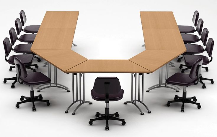 a conference table with chairs around it on a white background in front of a group of desks