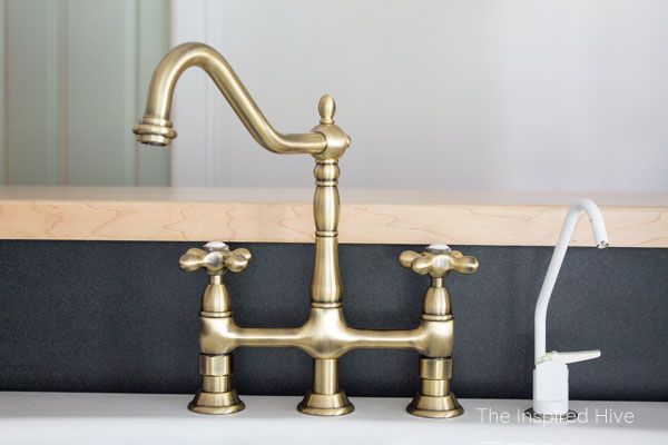 a faucet that is sitting on top of a sink