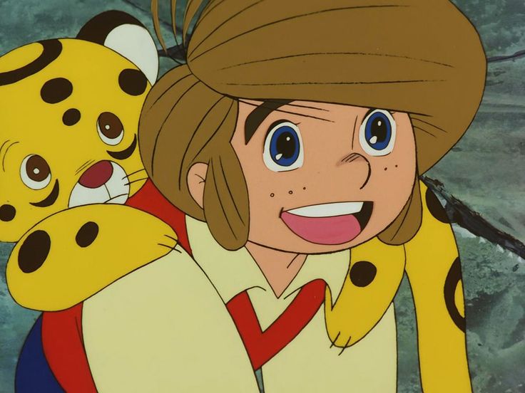 a woman holding onto a stuffed animal in front of a cartoon character with blue eyes