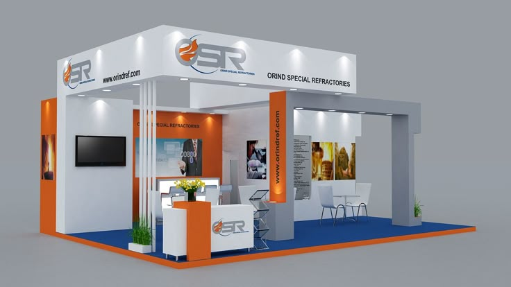 an exhibition stand with orange and white accents