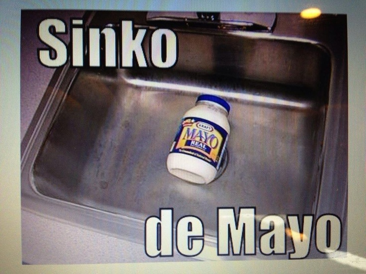 a bottle of mayonnaise sitting on top of a sink next to the words sinko de mayono