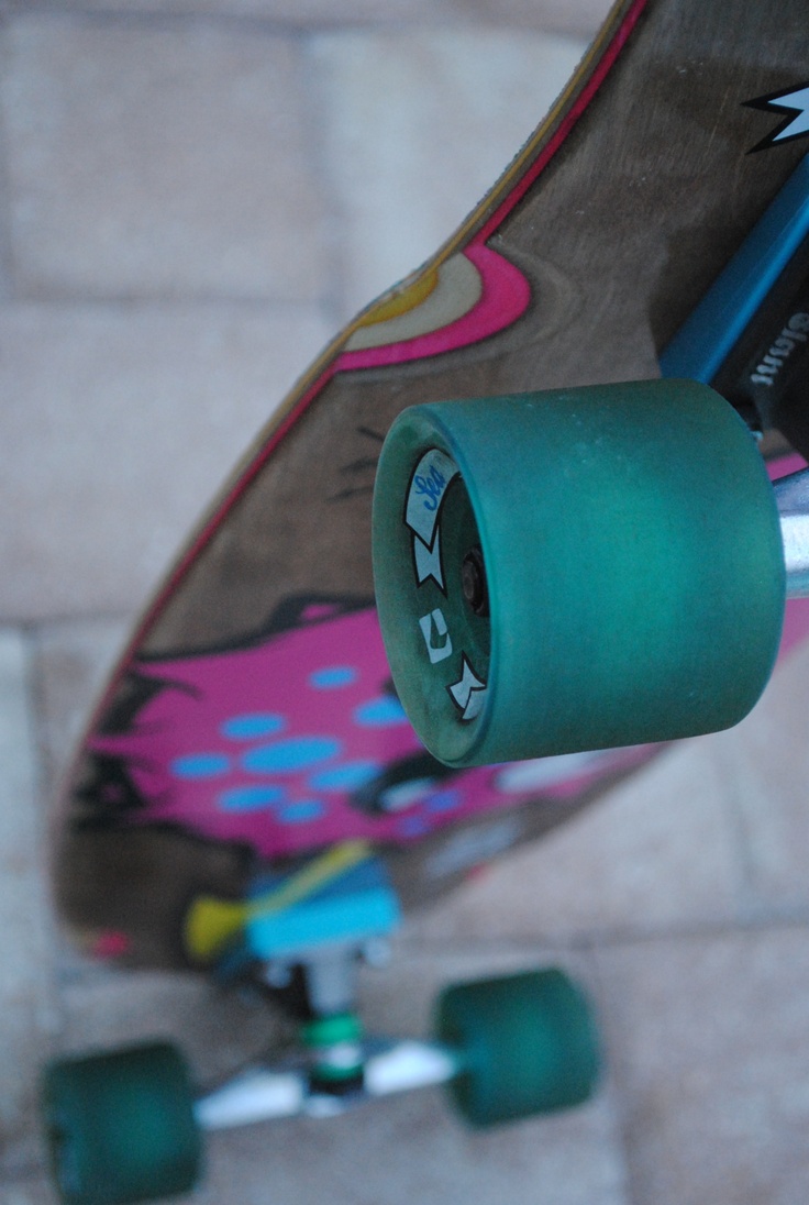 a skateboard with some writing on it