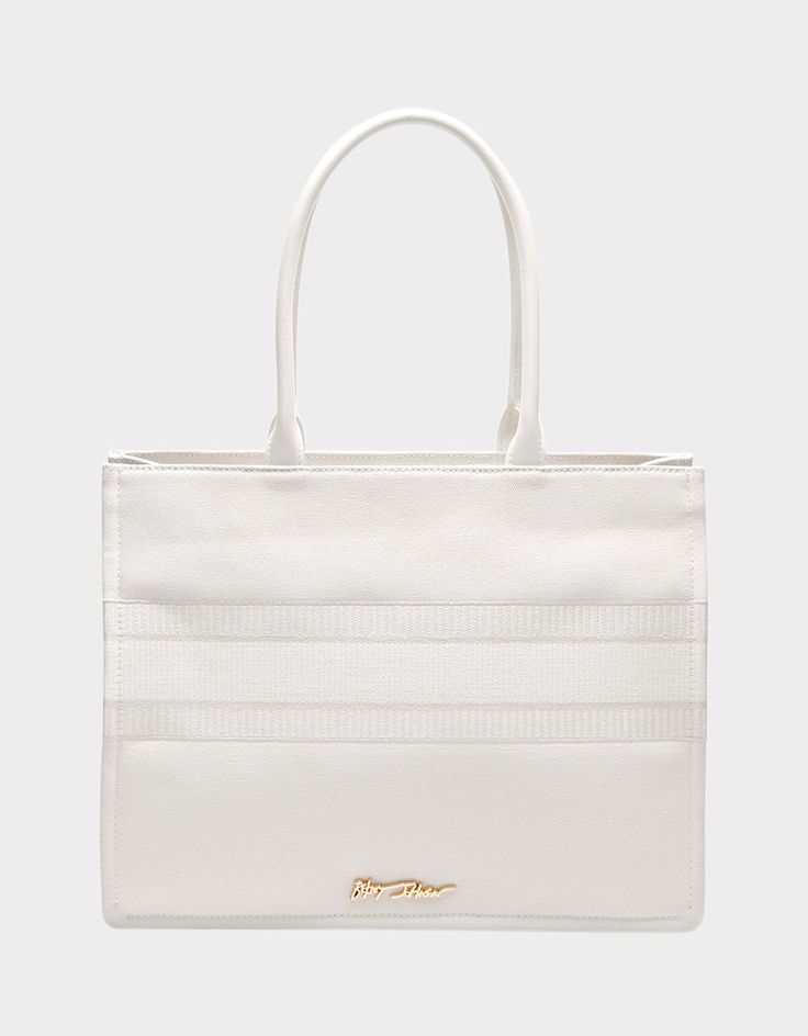 Looking for the perfect bachelorette tote? Look no further! This white canvas BRIDE TOTE BAG is the ultimate accessory for your special day. Make a statement as you sashay down the aisle with this beautiful and festive bag carrying all of your bridal essentials! Canvas textile material 14" L x 5.5" Dx 11" H Imported Luxury White Canvas Bag With Top Carry Handle, White Canvas Bag With Handles, Luxury White Rectangular Canvas Bag, White Canvas Shoulder Bag With Double Handle, White Canvas Shoulder Bag With Handles, White Luxury Canvas Shopping Bag, Luxury White Canvas Shopping Bag, White Canvas Bags, Trendy White Canvas Bag