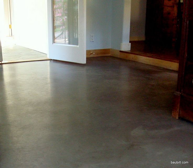 an empty living room with no one in it or someone standing on the other side