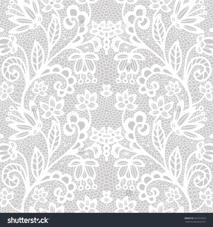 a white lace pattern with flowers and leaves