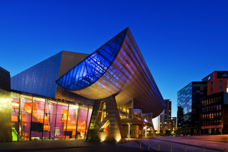 a large building that is lit up at night