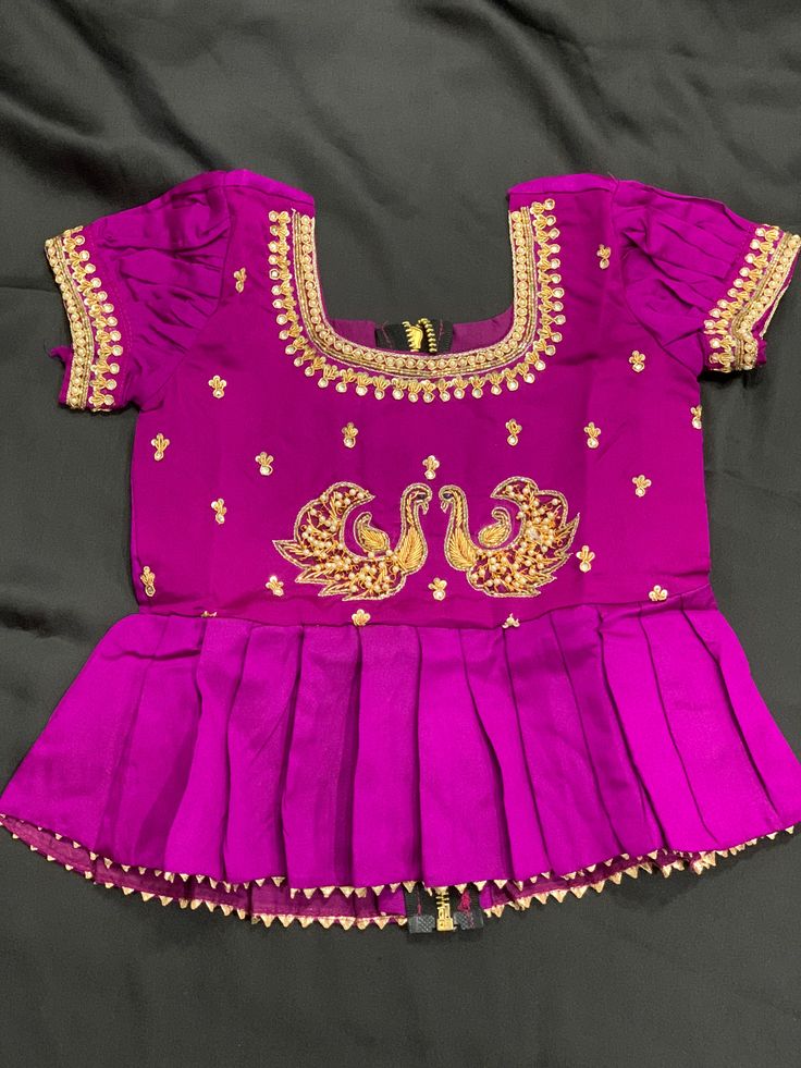 Exclusive Banarasi Big Border lehenga paired with pretty maggam work on silk blouseChest - 11 inch Dress height- 24 inch *Can can skirts' with 2 layers crepe lining and 4 inches canvas belt*Age categories 1-2 yrs Pink Silk Sets With Dori Work, Festive Silk Sets With Dori Work, Anarkali Sets In Raw Silk With Cutdana Details, Purple Art Silk Sharara With Dori Work, Purple Art Silk Sets With Resham Embroidery, Anarkali Art Silk Sets In Purple, Purple Raw Silk Sets For Navratri, Anarkali Silk Set With Dori Work, Purple Anarkali Art Silk Sets