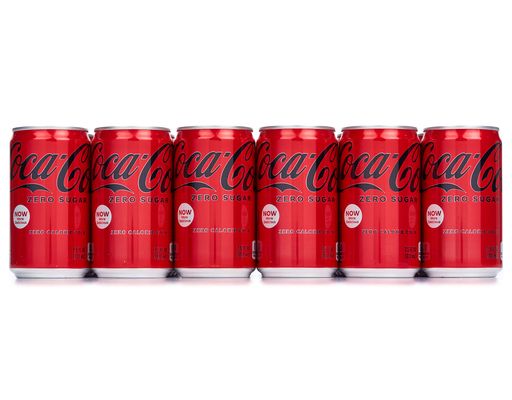 six cans of coca cola are lined up