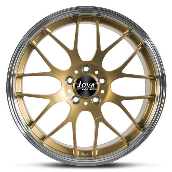 a wheel that is gold and silver with the word jove on it's side