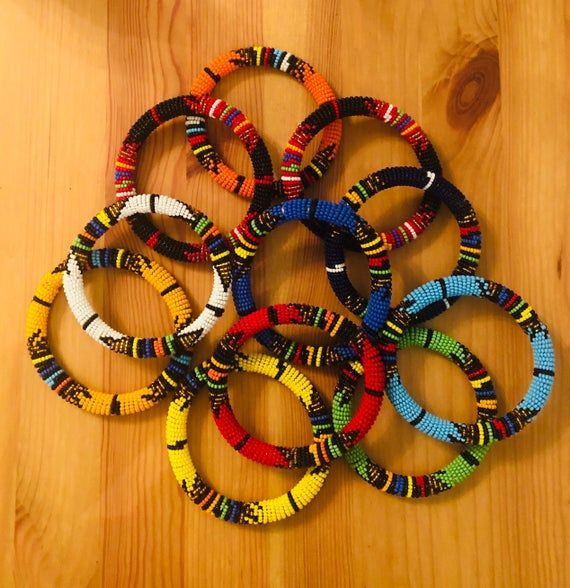 African Zulu beaded bracelets | Etsy Multicolor Braided Bead Bangle Bracelet, Multicolor Braided Bracelet Bangle, Multicolor Braided Bangle Bracelet, Multicolor Beaded Braided Bracelets, Multicolor Hand-strung Braided Bangle Bracelet, Multicolor Hand-strung Beaded Bangle, Hand-strung Multicolor Beaded Bangle, Multicolor Hand Wrapped Braided Bracelets With Round Beads, Friendship Bangle Beaded Bracelets