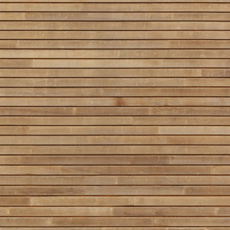 a wooden wall with vertical slats on it