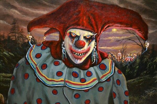 a painting of a clown with red hair