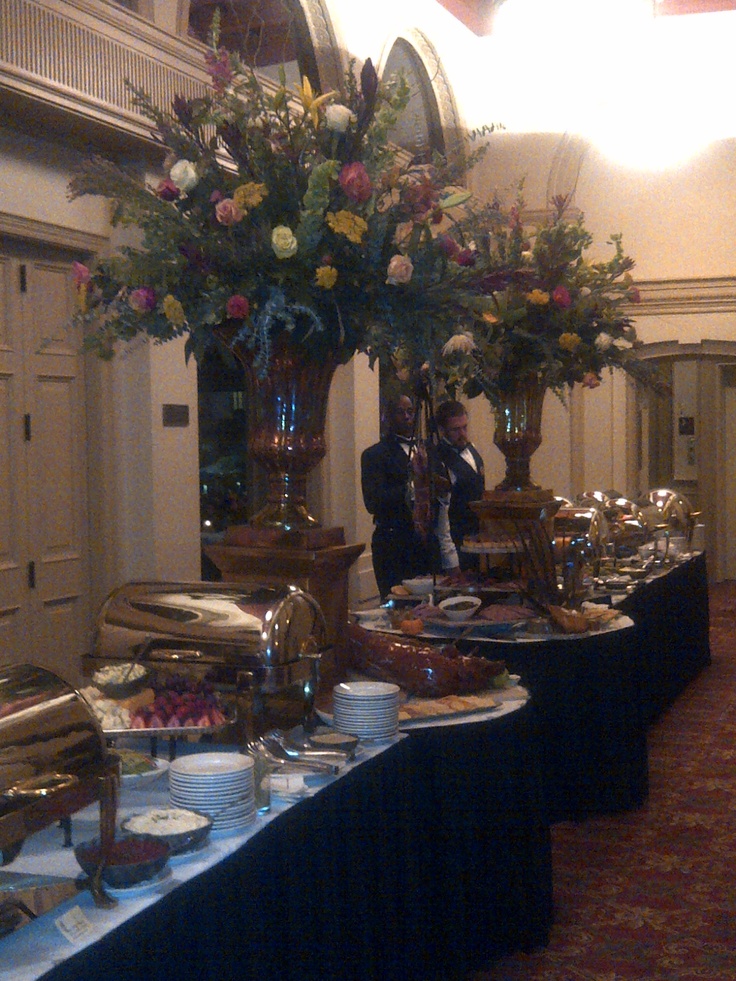 the buffet table is set up for two people to eat