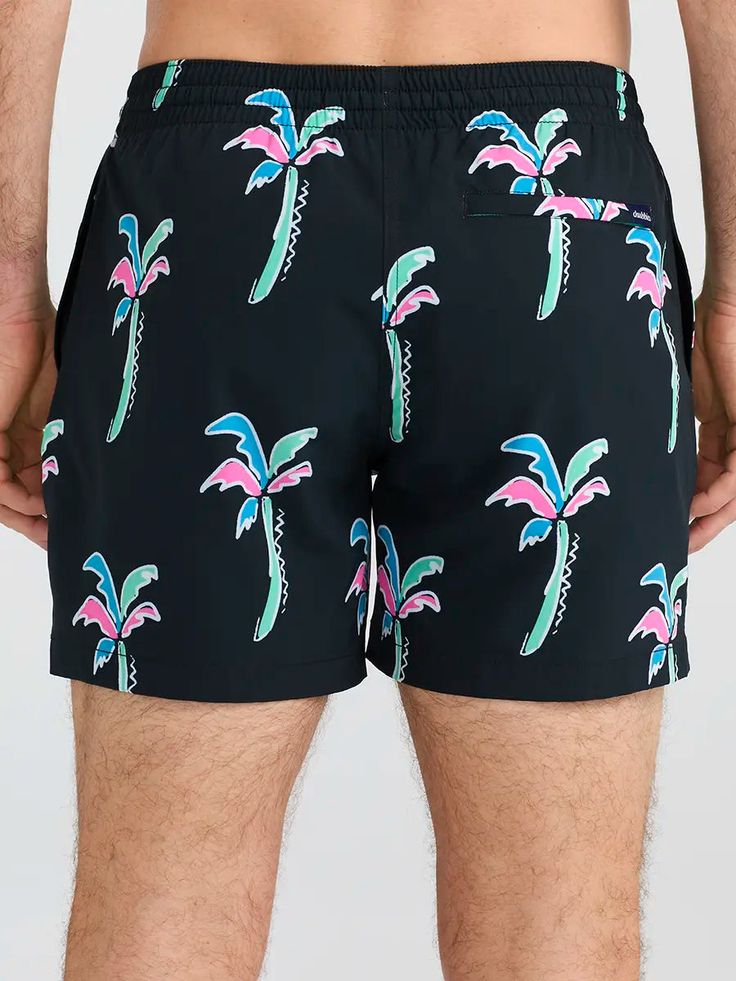 Grab your sunglasses and your flamingo floaty and sink into island time with these classic swimmers. These jealousy-inducing trunks feature an ultra quick drying shell, mesh basket liner and a zipper back pocket. Not to mention the elastic waistband and build-in drawstring designed to keep your trunks secure from the swim up bar all the way to the all you can eat crab leg buffet. Fabric: 92% Polyester/8% Spandex Machine Wash Cold, Tumble Dry Low Best for: Swimming, Sunbathing, Boat Days, Boogie Boat Days, Swim Up Bar, Havana Nights, Basket Liners, Crab Legs, All You Can, Havana, Back Pocket, Swim Trunk