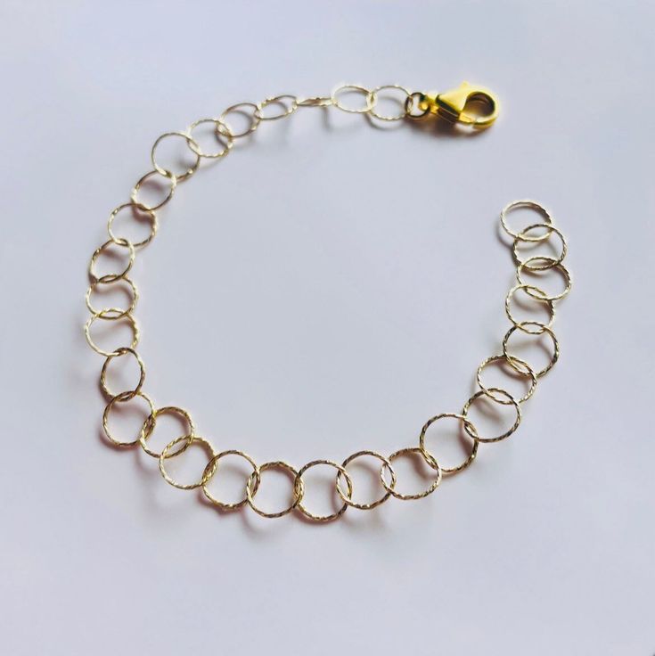 This delicate bracelet is made using a delicate and decorated filigree chain in Italian Sterling Silver 925, 9k Gold plated. The size will be made to order to suit you perfectly so please do not forget to select your size ✨ Every piece of jewellery is unique and made to order and it comes with a sustainable gift box 🌱 💝 Gold Sterling Silver Bracelets, Gold Sterling Silver Chain Bracelet With Lobster Clasp, Gold Sterling Silver Bracelets, Tarnish Resistant, Everyday Gold Sterling Silver Charm Bracelet, Gold Tarnish Resistant Sterling Silver Bracelets, Yellow Gold Sterling Silver Chain Bracelet With Lobster Clasp, Gold Sterling Silver Tarnish-resistant Bracelets, Handmade Dainty Gold Plated Charm Bracelet, Dainty Handmade Gold Plated Charm Bracelet