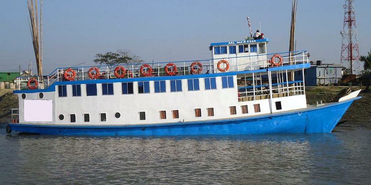 a large blue and white boat in the water