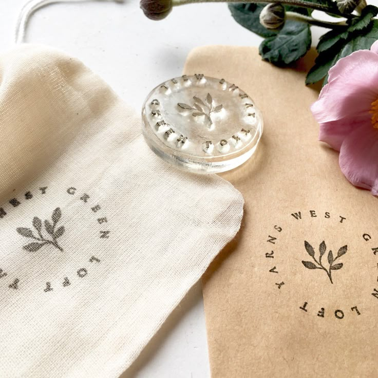 a close up of a flower on a cloth